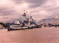 HMS Belfast moored in the Thames River near Tower Bridge